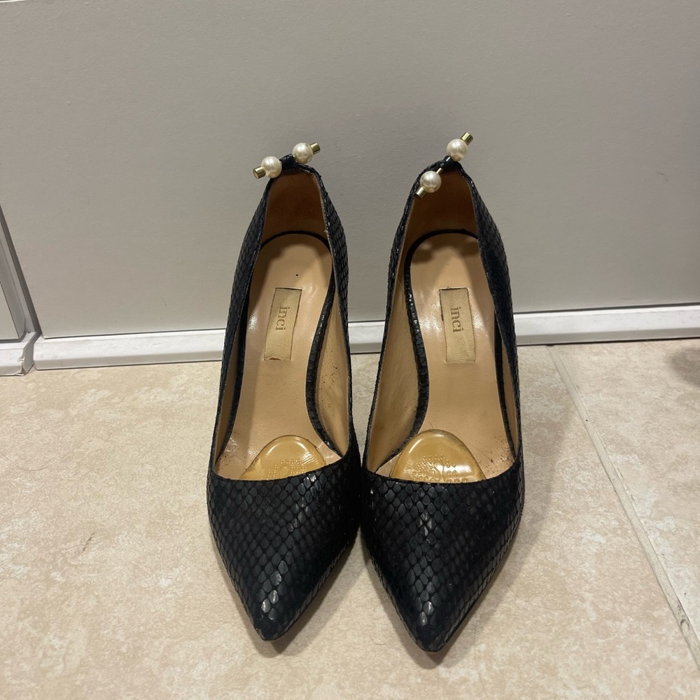 Black stilettos with pearl detail